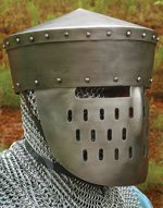A knighltly hemet, stand included.