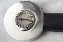 CUSTOM COIN EMBEDDED IN POMMEL