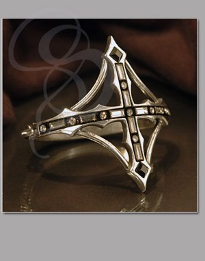 Decadent hinged bracelet, lavishly laced and pointed with Swarovski crystals